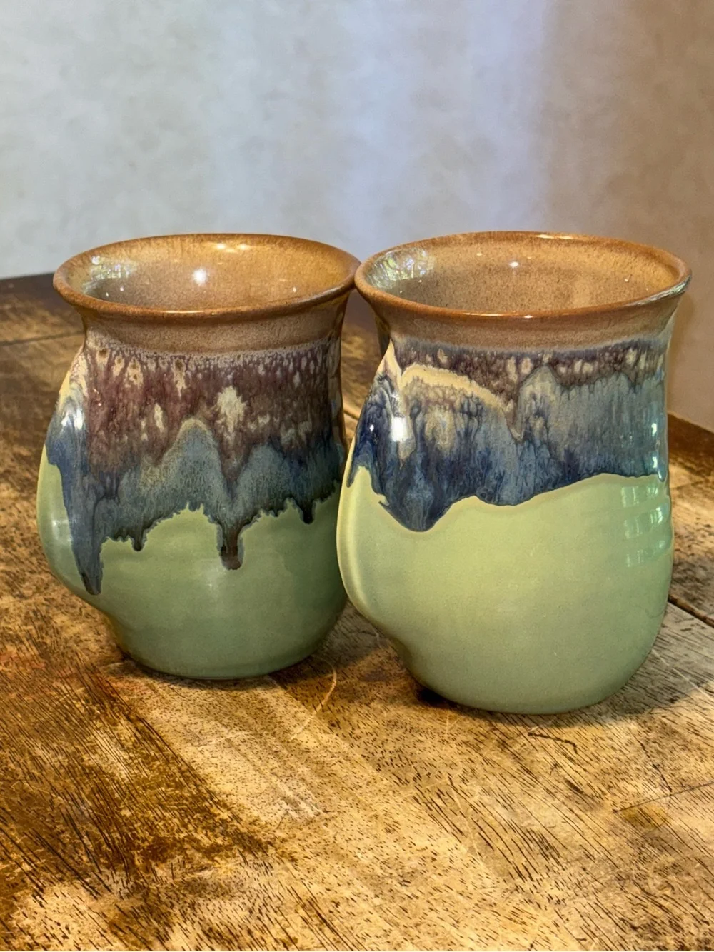 2013 & 2017 Neher Clay in Motion Mossy Creek Pottery Hand Warmer Mugs - Set of 2